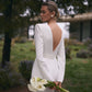 Jin – Elegantes Meerjungfrauen-Brautkleid mit tiefem V-Ausschnitt und Perlengürtel